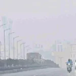 Hyderabad Weather Report: హైదరాబాద్లో ఈరోజు వాతావరణం - తేలిక వర్షం, మేఘాల మధ్య చల్లని గాలి 4 Hyderabad Weather Report Overcast sky in Hyderabad with light rain, showing bikers on a hazy road – perfect for illustrating the cloudy, rainy conditions in the city