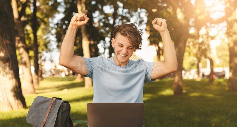 Excited Student Celebrating Success Laptop Outdoors Stock Photos ...